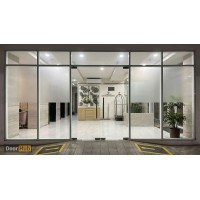 Smoked Sandblasted Glass Pivot Door 12mm UAE for Hotel Interiors